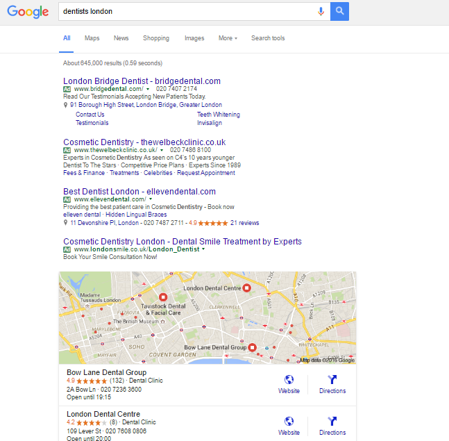 Four paid search ads and Local within SERPs