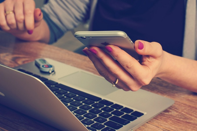 Woman holding iphone